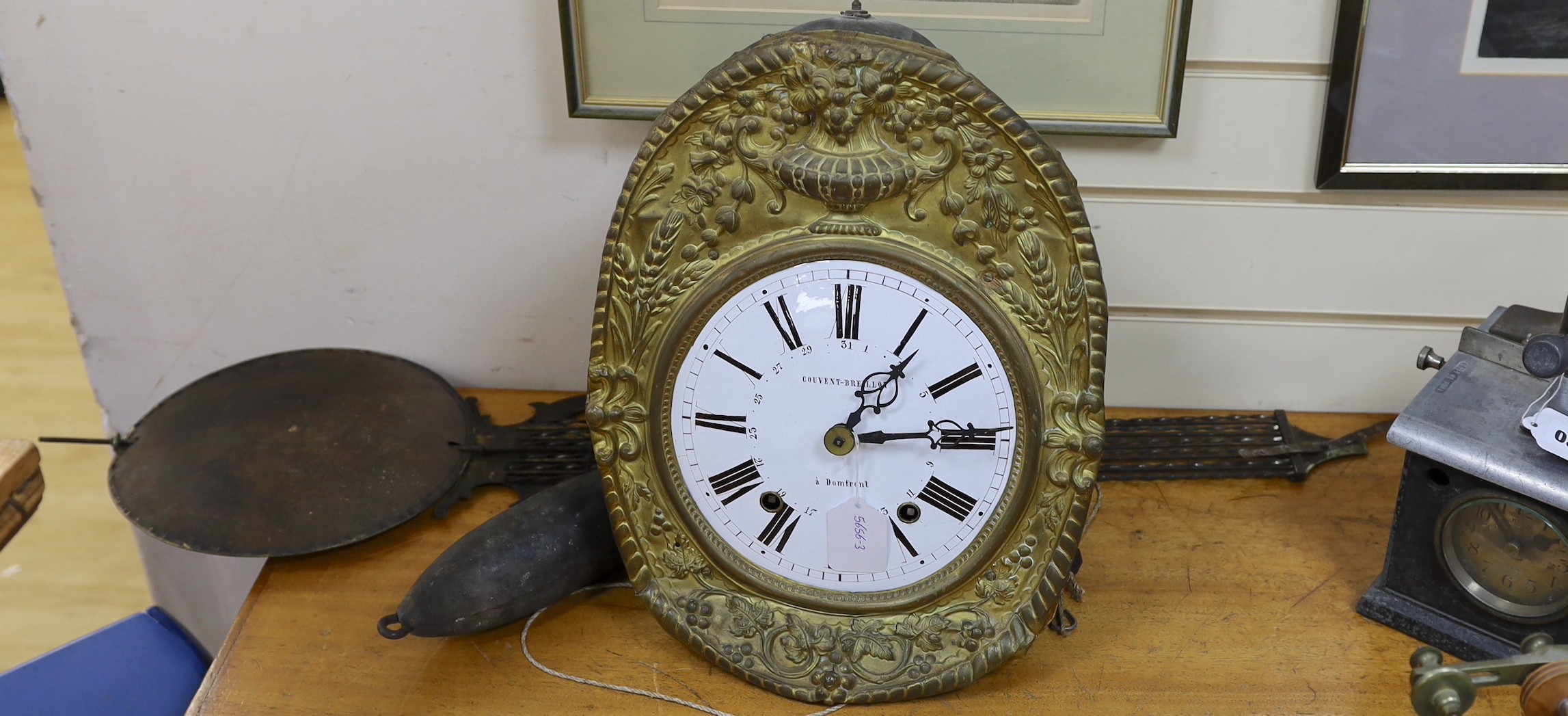 A 19th century French Comtoise eight day clock by Couvent-Breillot a’ Domfront, 42cm